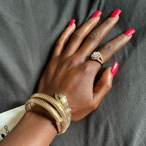 Green eyed wrap around snake bracket